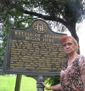 Longtime area resident and school board representative Ina Evans returns to the neighborhood to visit the site where her grandfather fought in the opening moments of the Battle of Atlanta. When she lived in the neighborhood, she did not realize that her grandfather from Tennessee had been here a hundred years before. Photo by Courtney Bryant