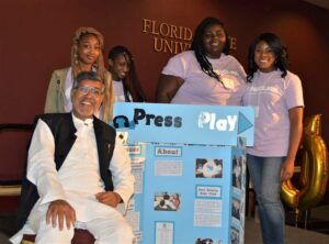 East Atlanta Teen Club members present their social justice podcast project to Nobel Peace Laureate Kailash Satyarthi. Photo by Idel A. Mena.