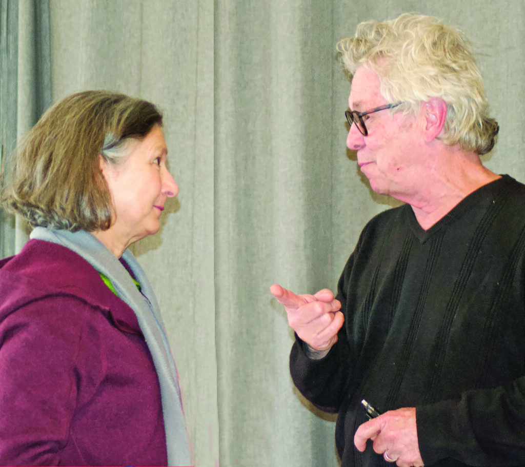 Pam Davis has a moment to talk with David Fulmer about his books after the presentations. Photo by Martyn Hope.