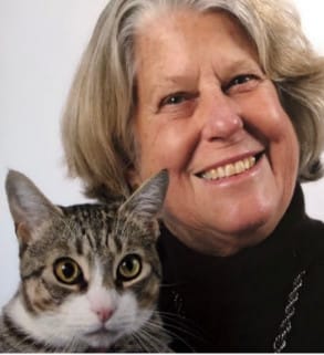 Picture of author Jenny Guberman with one of her cats